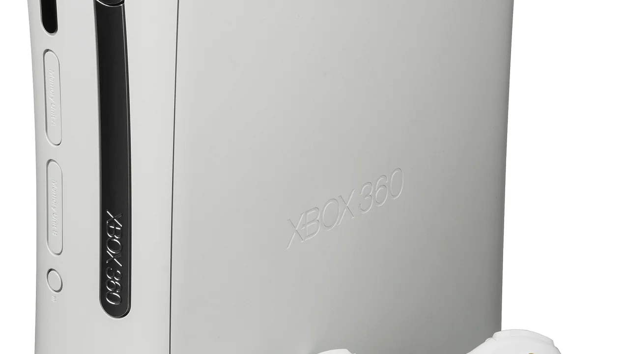 The Xbox 360, a video game console released by Microsoft in 2005. This is the "Pro" model from the launch line-up, which featured a 20GB hard drive, wireless controller and a silver DVD bezel. The production date of this unit is 2005-11-05, making it a very early unit. Of note is the gray on the hard drive at the top, which is very shiny and silvery. This was changed to a matte gray in later models. — cover image for Xbox Developer Direct 2026: Forza Horizon 6, Fable and Kiln